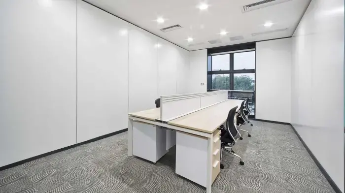 Modern office workspace illuminated with balanced lighting