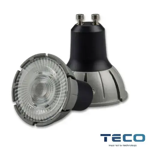 Two angled views of a black and silver TECO GU10 LED spotlight bulb with a clear frosted lens and metallic housing for modern lighting.