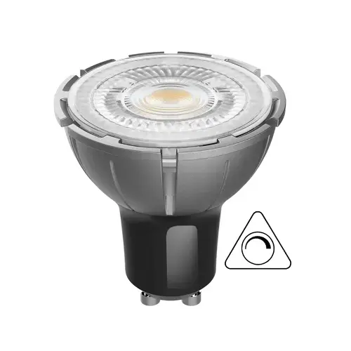 Close-up image of a modern GU10 LED light bulb with a white plastic housing, emitting warm yellow light from the front, and a dimmable symbol on the side for accessibility.
