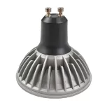 Close-up of a GU10 LED bulb with black cylindrical base, silver parabolic reflector, and two protruding metal pins for socket connection.