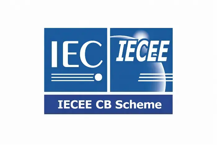 Blue rectangular logo with IEC emblem in left square, IECEE text and global icon in right section, and 'IECEE CB Scheme' inscription below for electrical certification.