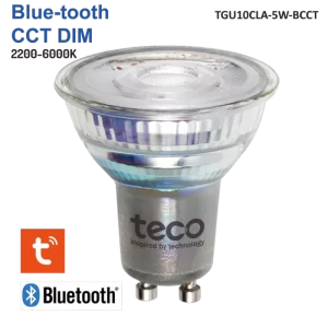Close-up of a transparent Teco LED spotlight bulb with Bluetooth connectivity and CCT dimming from 2200K to 8000K on black background.